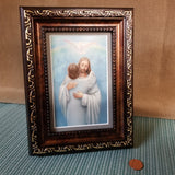 Entering heaven Jesus embrace framed print