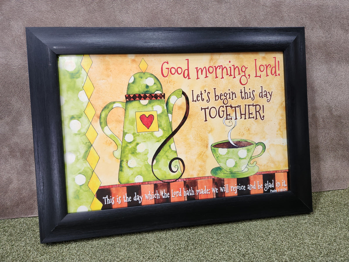 Framed artwork with a green teapot and cup, text 'Good morning, Lord! Let's begin this day TOGETHER!' on a checkered background.