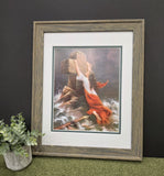 Woman clinging to Cross in the sea Rock of Ages