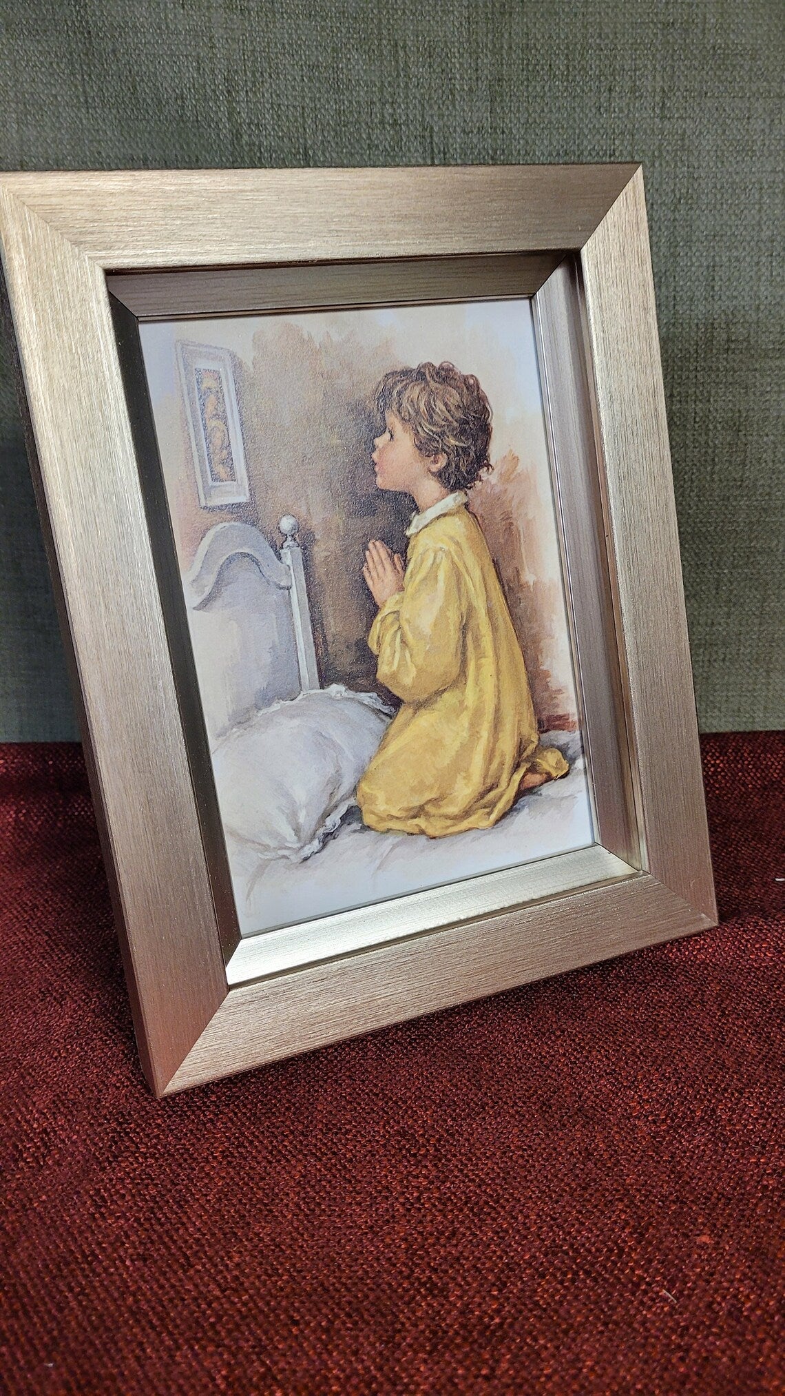 Vintage print of little boy praying