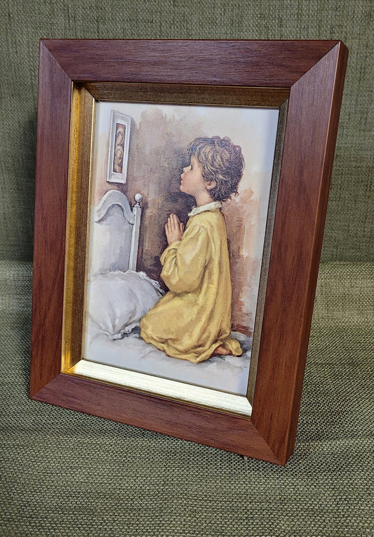 Vintage print of little boy praying