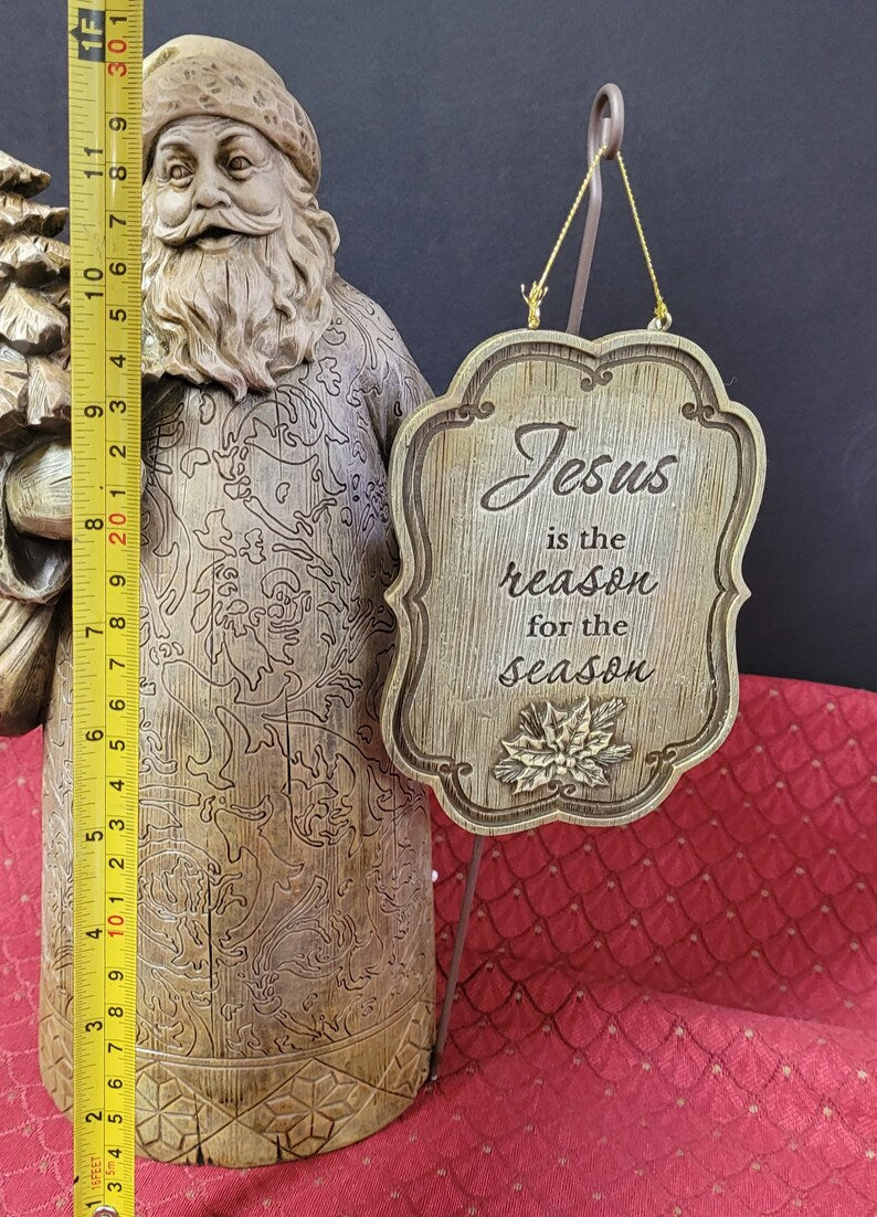 Santa resin statue with Jesus is the reason for the season